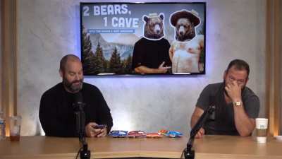 Tom Segura shows Bert Kreischer a video of a horrific accident