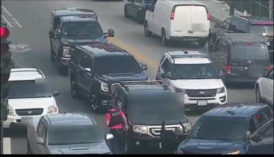 Chicago police surround people wanted for shooting a cop