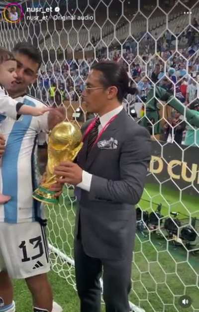 &ldquo;Salt Bae&rdquo; prying the World Cup trophy from Cristian Romero and his son.