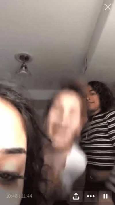 "Friend" lifts shirt