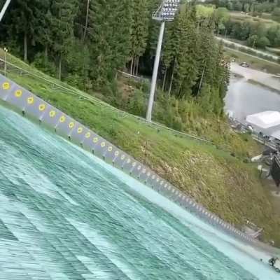Jumping a bike off a ski jump