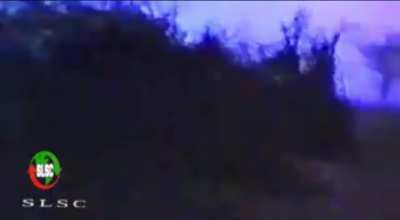 1988, Somaliland SNM militia trying to capture Hargeisa are on the offensive against Somalia regime on the outskirts of the city (the now capital of Somaliland). Somalia fighter jet seen doing low flyby and a vehicle of there&rsquo;s is burning. (Mission was a 