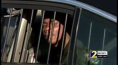 Interview with the person in the back of a police car
