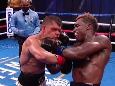 Big uppercut from Jermall turns Derevyanchenko's face into Jelly