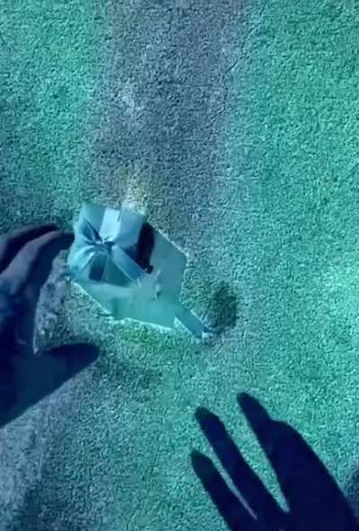 Throwing rock in the pool