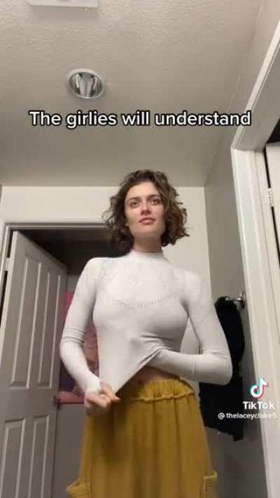 Playing with her titties