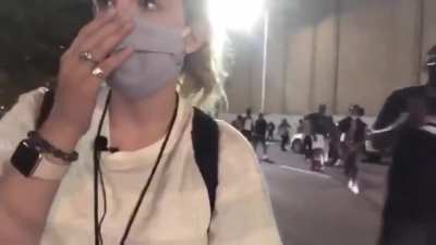 Protesters surrounding and beating journalists