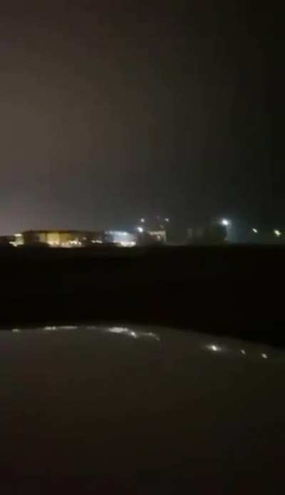Saudi Arabian missile defense intercepting an incoming suicide drone/ballistic missile barely above the ground this evening