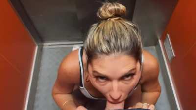 Gagging on his big cock in the elevator