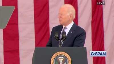 Biden tells a story about pitcher Satchel Paige, referring to him as "the great negro at the time."