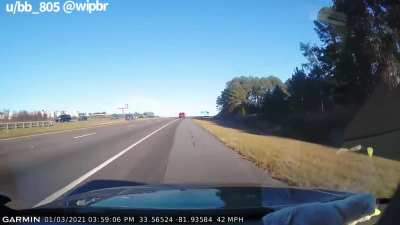 Driver going the wrong direction on the interstate crashes head on at 70mph into another car. Both drivers walked away with no major injuries