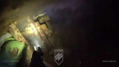 AZOV conducting a CQB raid in a Russian trench. (Unknown location and time.)
