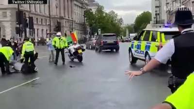 Boris Johnson's car struck from behind as protester runs in front of convoy