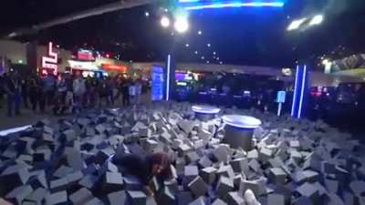 Adriana Chechik (Twitch streamer) looks seriously hurt after jumping in the foampit. Looks like TwitchCon cheaped out on the padding and amount of foam. She has broken her back in two separate places.