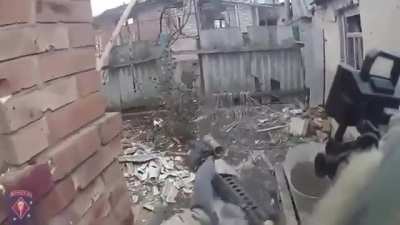 Archival POV footage of volunteers in the "Rogue Team" together with another Ukrainian SOF unit clearing private houses and basements in Bakhmut, Winter 2023