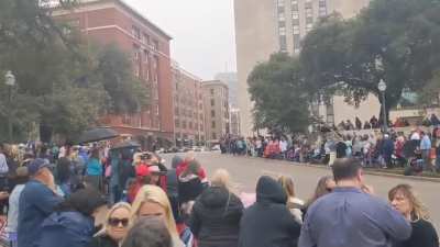 QAnon conspiracists gather in Dallas on the grassy knoll today awaiting JFK Jr's return.