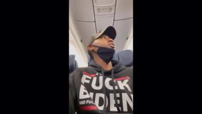 Guy with a "Fuck Biden" hoodie is told to either remove the sweatshirt or get off the plane. He decides to argue