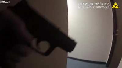 Police Officer Shoots Blindly Into Closed Apartment Door hitting unarmed resident