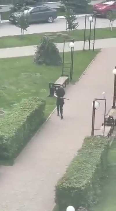Video of Perm University shooter walking the street armed, without watermark