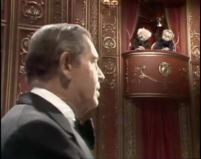 Milton Berle gets heckled from the balcony by Statler and Waldorf, during his 1977 appearance on "The Muppet Show". The two elderly muppets were in fact based on a character from his 1960s TV series, played by comedian Irving Benson, who made fun his act 