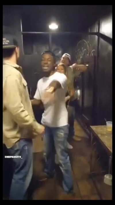 He found his girl in the men's restroom stall with another dude