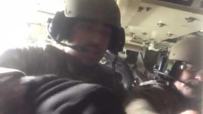 My brother a 13b (left) loading in shells in a M109a6 paladin 2018 pt1