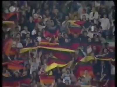 Iranian Chelsea fans observing etiquette with respect to the national German anthem