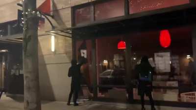 Anarchists violently cleaning windows in Portland.