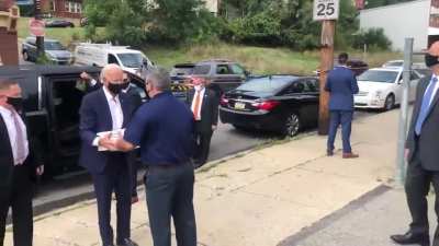 Joe Biden tells a Trump supporter standing on a truck heckling him, &rdquo;Don&rsquo;t jump.&rdquo;