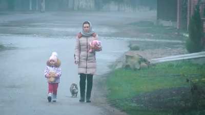 Let me just film this woman and her child on a walk