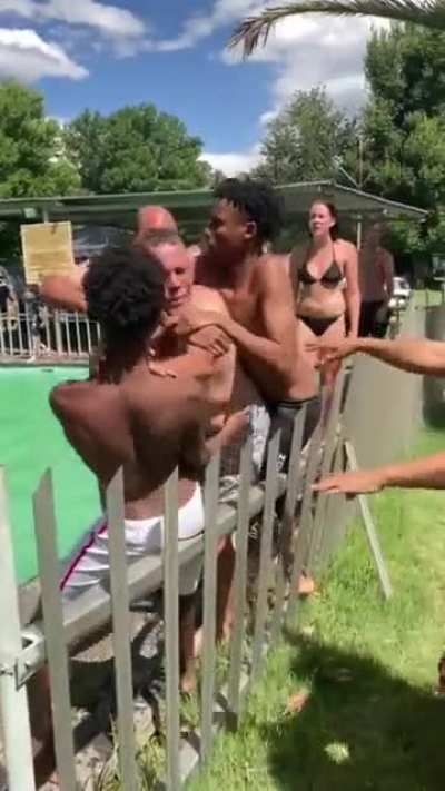 Racist old white man fighting with black kids because they are apparently not allowed in the pool as it's reserved for the "white people". Occured in South Africa.