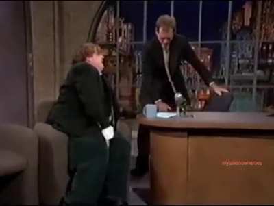 This entrance by Chris Farley...