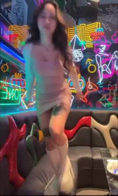Petite Asian shows off her dress