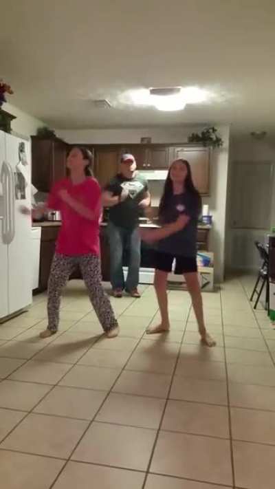 Dad surprises kids.