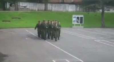 Russian army soldiers sing, "Barbie girl" while marching
