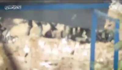 Combat footage showing a squad of IDF soldiers under fire by Hamas