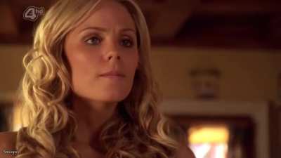 Laura Vandervoort in a bikini