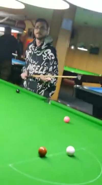 My friend's face expressions while playing Snooker