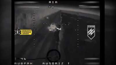Ukrainian FPV drone hits a Russian TOS-1 Heavy Flamethrower System at night which is destroyed after a large explosion