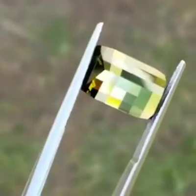 Professional gem cutter Jordan Wilkins attributes &lsquo;opposed bar cuts&rsquo; to achieving the pixelated look, where the facets on the top of the stone are perpendicular to the facets on the bottom of the stone.