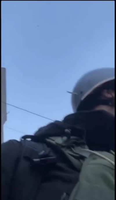 Russian missile flies over a journalists