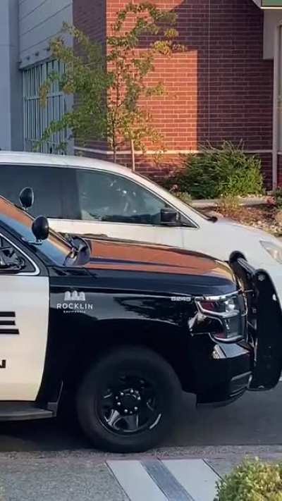 Cop points gun at surrendering young man then tries to break his arm.