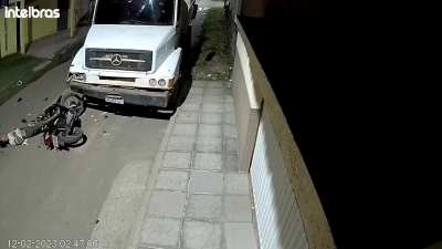 Biker crashes into a parked truck