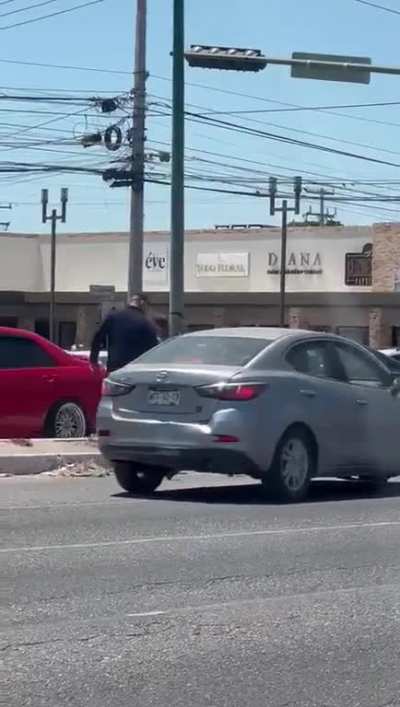 Guys square up after a driving incident