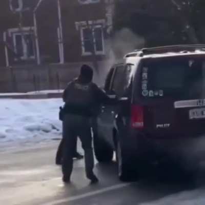 THE WHEELS ARE FULLY TURNED AWAY FROM THE OFFICER.

Watch in SLOW MO.
No intention IMO to hit anyone.
Sole intention based on wheel/steering wheel to LEAVE the scene 

NOT A THREAT.
Look at the wheel.