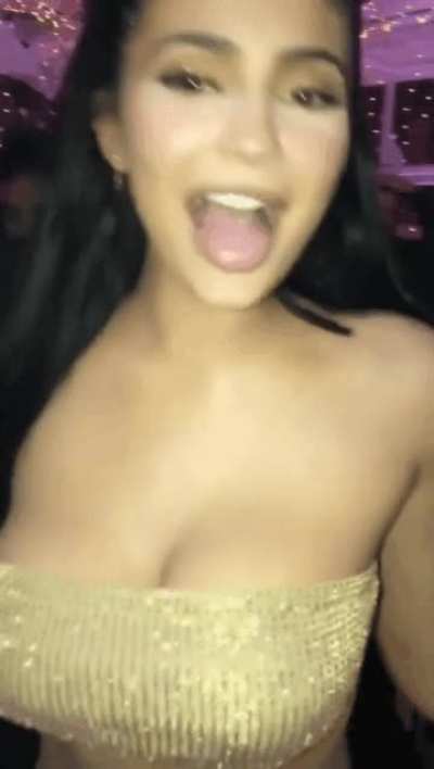 Sticking her tongue out