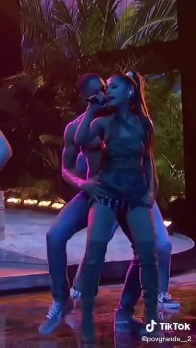 Ariana Grande with backup dancer
