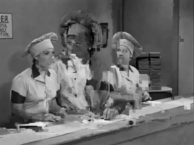 Lucille Ball and Vivian Vance struggle to keep up with a chocolate conveyer belt in a candy factory, in a 1952 episode of "I Love Lucy". Considered one of the series' most iconic moments.