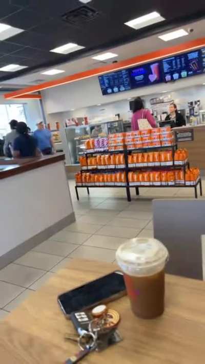 Dunkin&rsquo; Donuts employee going wild