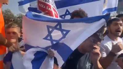 Jewish settler mob protected by the Israeli military and police have gathered outside a Palestinian neighborhood shouting "death to Arabs"